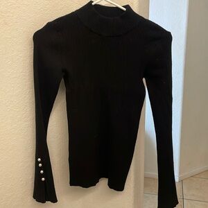 Sweater with pearl like details